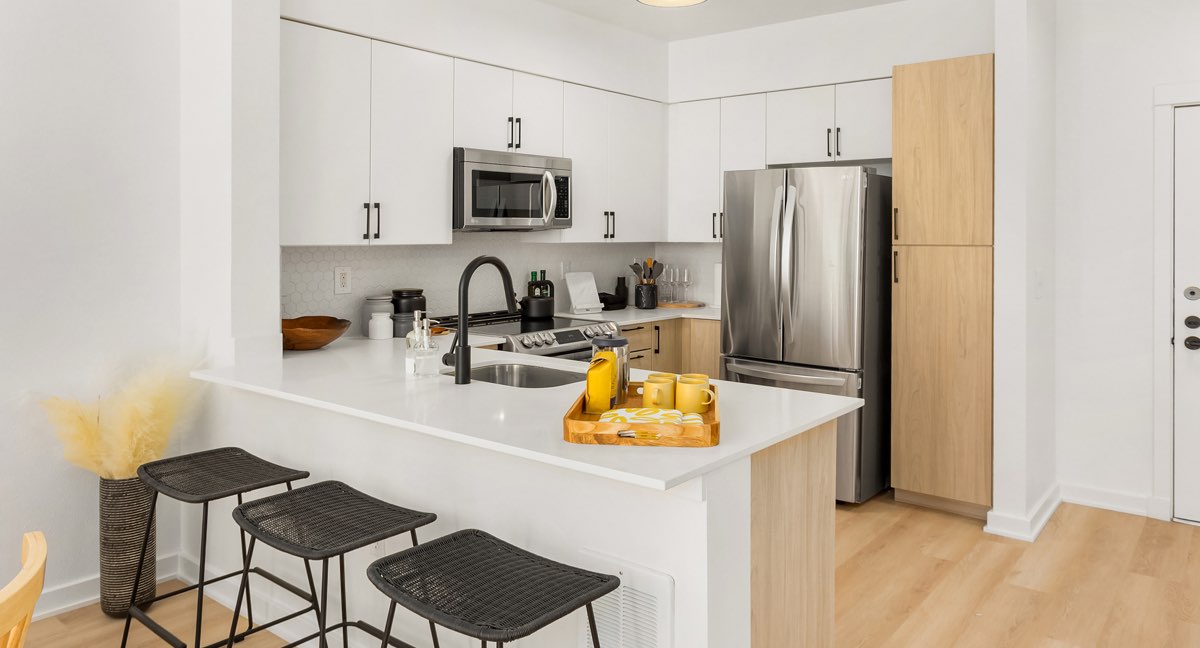 Tile backsplash and quartz countertops.